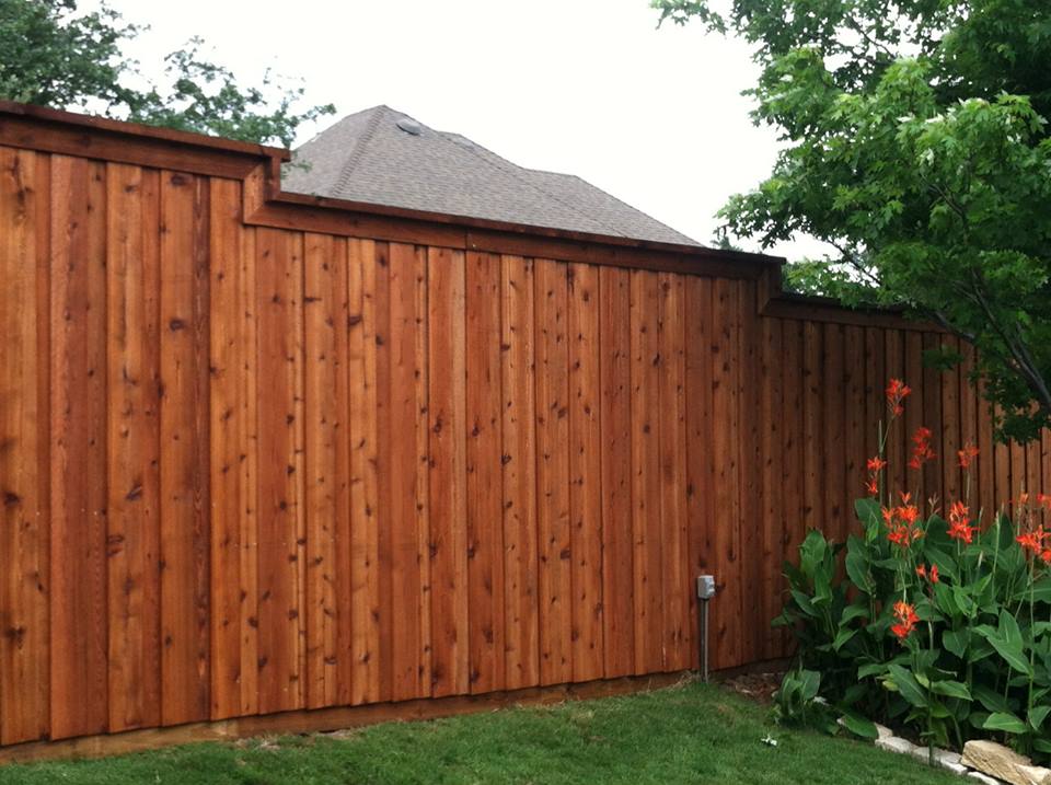 Cedar and iron fence detail from a Texas Traditions Outdoors project.
