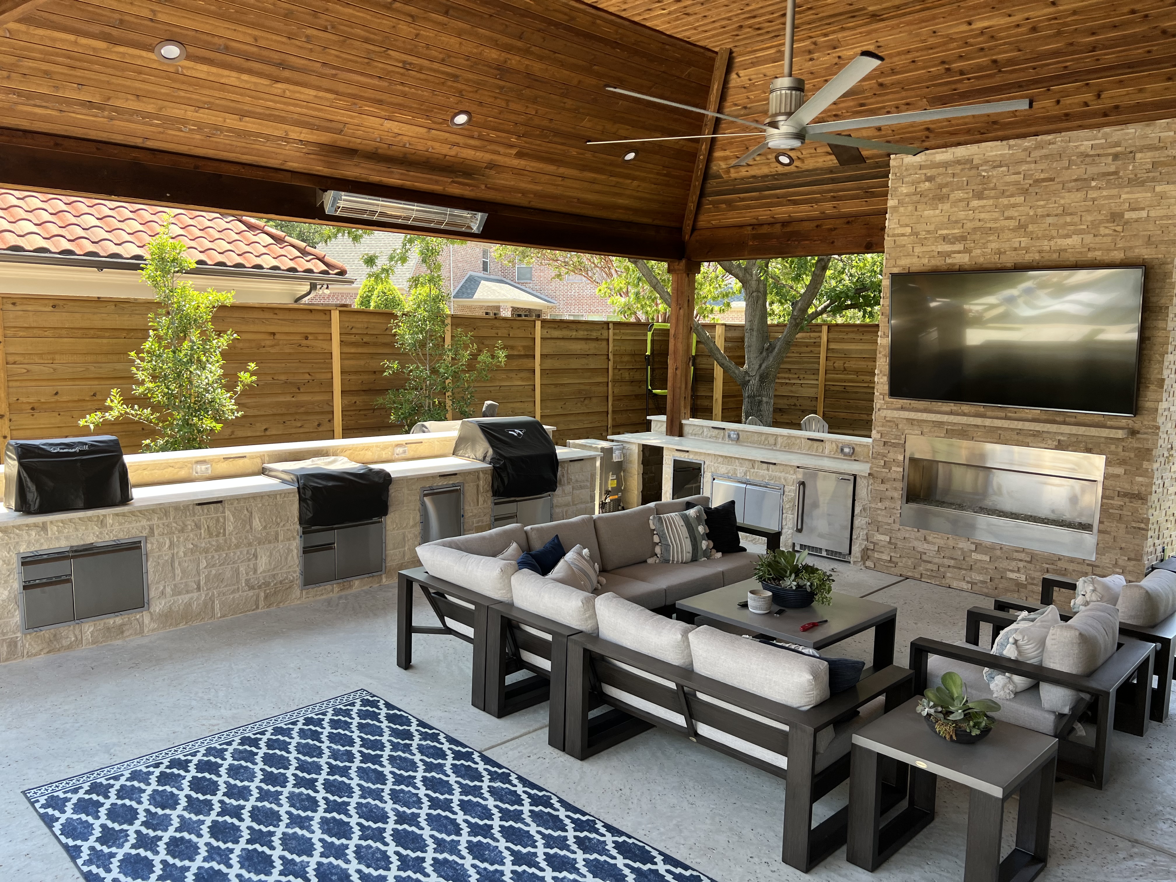 Outdoor kitchen and covered living space built for a North Texas backyard.